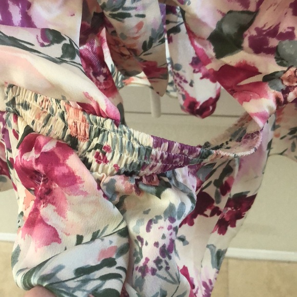 Express floral faux wrap tie back peplum top. - Picture 5 of 6